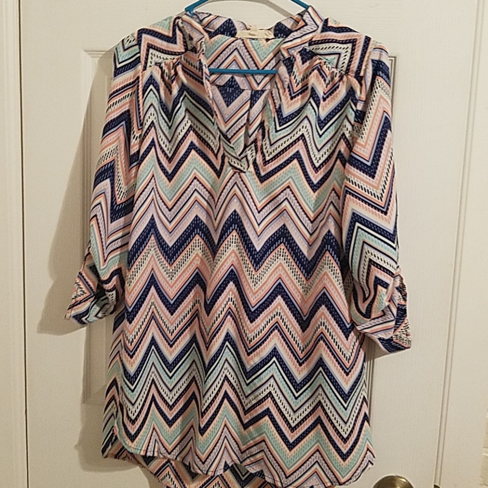 Three-quarter length sleeves shirt.